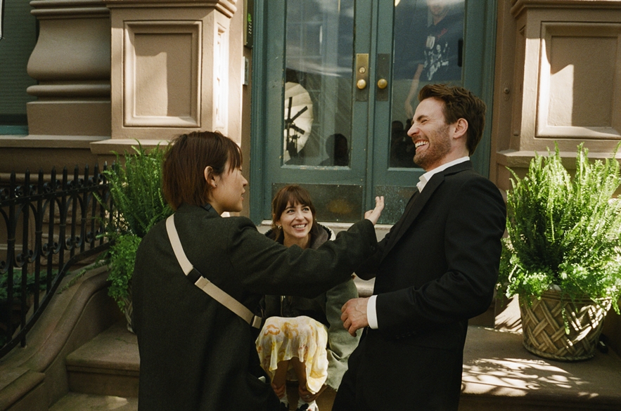 Celine Song, Dakota Johnson and Chris Evans on the set of A24’s MATERIALISTS
